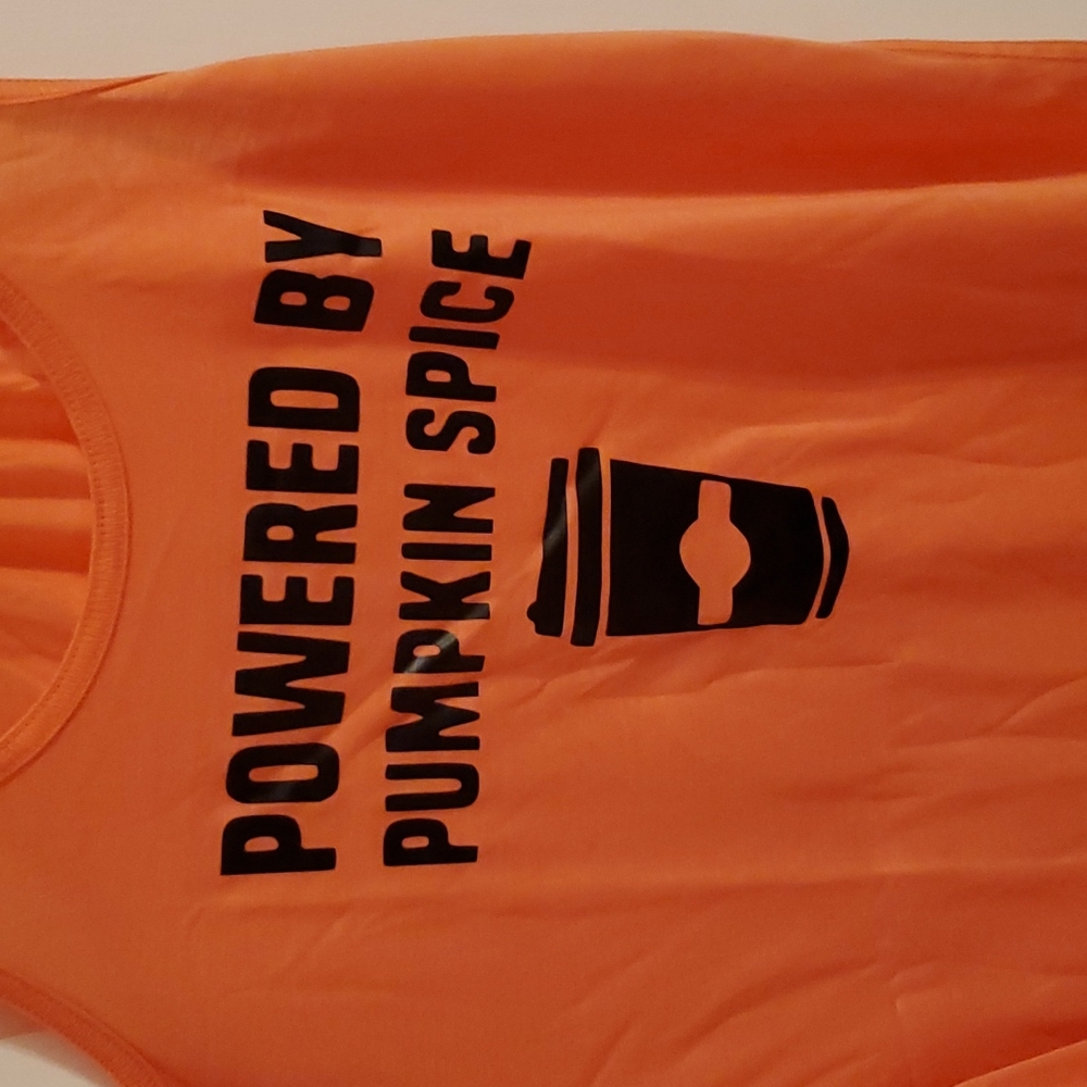 Powered by pumpkin spice flowy racer back tank